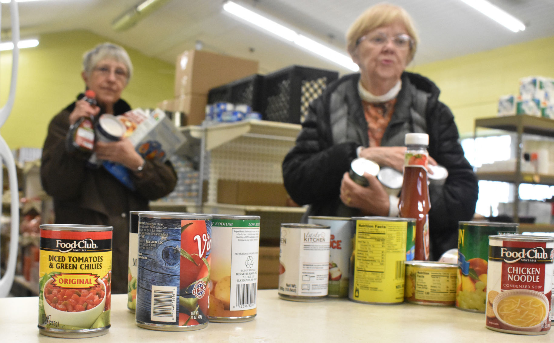 Sue Bradley and Jane Fullerton at food pantry